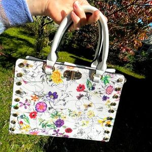 Dasein’s White Simulated Leather Floral Studded Satchel & Wristlet / Clutch